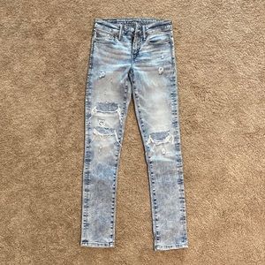 American Eagle AirFlex 360 patch skinny jeans.